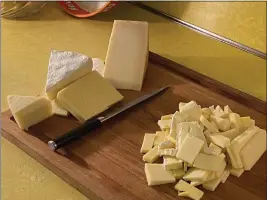  ?? BETHANY JEAN CLEMENT — THE SEATTLE TIMES ?? Choosing your own cheeses is what can make this the perfect macaroni for you— here, we have sharp cheddar, nutty Comté, melty-rich Fontina and Camembert for additional velvety texture and intense flavor.