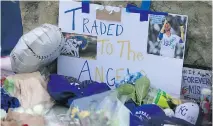  ?? AP PHOTO/ORLIN WAGNER ?? A memorial for Kansas City pitcher Yordano Ventura was set up outside Kauffman Stadium on the day he died.