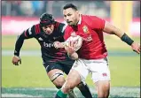  ??  ?? British and Irish Lions inside centre Ben Te’o runs past Canterbury Crusaders’ Jordan Taufua during their match
in Christchur­ch, New Zealand, on June 10. (AP)