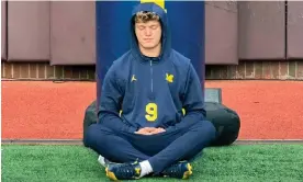  ?? Photograph: Larry Lage/AP ?? JJ McCarthy is known for meditating before games.