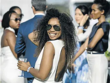  ??  ?? ODDS-ON FAVOURITE: Siyanda Ralane was among those who brought glamour to the L’Ormarins Queen’s Plate horse-racing event at Kenilworth in Cape Town at the weekend