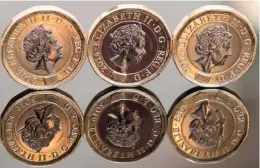  ??  ?? LONDON: In this posed photograph, newly-issued 12-sided £1 (one pound) coins are pictured in London yesterday. Britain’s new £1 coin with the symbols of England, Scotland, Wales and Northern Ireland went into circulatio­n from yesterday on the eve of...