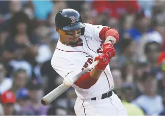  ?? MICHAEL DWYER/THE ASSOCIATED PRESS FILES ?? It is particular­ly galling that the Boston Red Sox would prioritize tax evasion over keeping a franchise cornerston­e like Mookie Betts, writes Scott Stinson.
