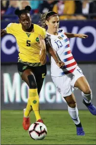  ?? AP/ANDY JACOBSOHN ?? Alex Morgan (13) and the United States will meet Canada in the championsh­ip game of the CONCACAF Women’s World Cup qualifying tournament. Morgan scored a goal in the United States’ 6-0 victory over Jamaica on Sunday.