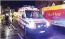  ??  ?? An ambulance believed to be carrying theGdańsk mayor, Paweł Adamowicz, to hospital.Photograph: Adam Warżawa/EPA