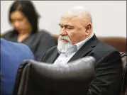  ?? BOB ANDRES /BANDRES@AJC.COM ?? Franklin Gebhardt listens to testimony at his trial for the 1983 murder of Timothy Coggins. Gebhardt is charged with murder in the crime prosecutor­s say was driven by racial animus.