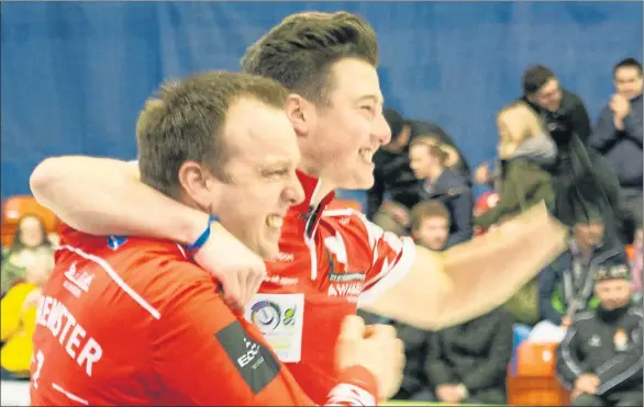  ?? Picture: Tom J Brydone ?? GET IN: Tom Brewster, left, and Hammy McMillan celebrate their Scottish title win.