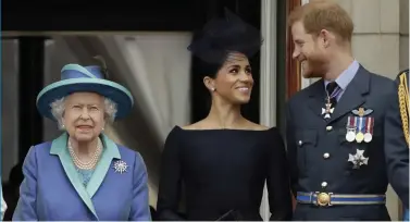  ??  ?? Her Majesty The Queen and plain old Harry and Meghan