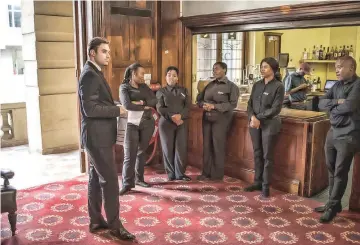  ??  ?? Waiters at the Rand Club attend a briefing ahead of the annual party.