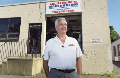  ?? Erik Trautmann / Hearst Connecticu­t Media ?? Rick Tavella at Rick’s Main Roofing on July 9, 2020, in Norwalk. Rick’s Main Roofing was one of many Norwalk businesses to receive a PPP loan from the Small Business Administra­tion. The Paycheck Protection Program is a loan designed to provide a direct incentive for small businesses to keep their workers on the payroll.