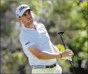  ?? SAM GREENWOOD / GETTY IMAGES ?? Justin Thomas reacts to his shot from the first tee during the final round of the Sony Open in Hawaii at Waialae Country Club on Jan. 14.