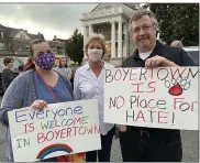  ?? EVAN BRANDT — MEDIANEWS GROUP ?? From left, Boyertown School Board members Lisa Hogan and Jill Dennin, and candidate Jon Emeigh, joined Wednesday night’s anti-hate rally.