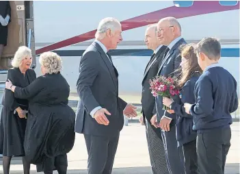  ?? ?? King Charles and Queen Consort Camilla, left, were welcomed to Belfast on Tuesday.