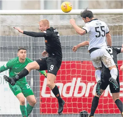  ?? Picture: SNS Group. ?? Craig Barr gets up highest to head in Dumbarton’s winner.
