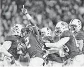  ?? MATT CASHORE/USA TODAY SPORTS ?? Stanford cornerback Wayne Lyons (2) celebrates after an intercepti­on in the fourth quarter Saturday against Notre Dame at Stanford Stadium.