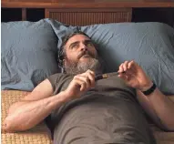  ?? AMAZON STUDIOS ?? Joaquin Phoenix plays a war veteran battling his own demons while rescuing missing girls in "You Were Never Really Here."