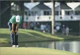  ?? Mike Ehrmann Getty Images ?? JORDAN SPIETH CAN’T believe his birdie putt didn’t go down on the 14th hole at Quail Hollow. Spieth needed two late birdies to finish with a one-over 72.