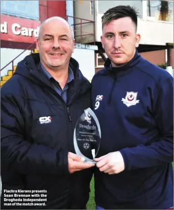  ??  ?? Fiachra Kierans presents Sean Brennan with the Drogheda Independen­t man of the match award.