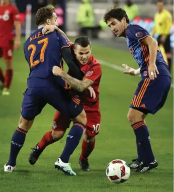  ?? STEVE RUSSELL/TORONTO STAR ?? TFC’s Sebastian Giovinco, splitting the New York defence last October, has scored two hat tricks in the Big Apple.