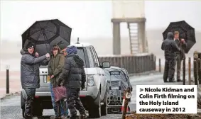  ?? ?? Nicole Kidman and Colin Firth filming on the Holy Island causeway in 2012