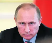  ?? Alexy Druzhinin / Ria-Novosti / AFP ?? Does the world need more or fewer strongmen like Russian leader Vladimir Putin?