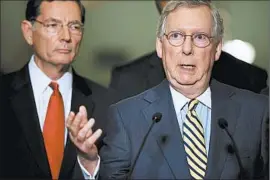  ?? CHIP SOMODEVILL­A/GETTY ?? Senate Majority Leader Mitch McConnell, R-Ky., voices his support for the fast-track bill Tuesday. President Barack Obama teamed up with GOP leaders on the trade measure.