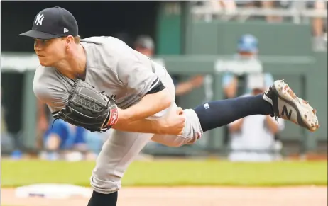  ?? Ed Zurga / Getty Images ?? Yankees starter Sonny Gray pitched eight innings of four-hit ball against the Royals on Sunday in Kansas City, Mo.