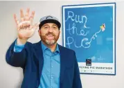  ?? RAY CHAMBERLAI­N/CONTRIBUTE­D ?? Jim Foliano, executive director of Ticket to Hope in Hamilton, aims to break the World Record for the most high-fives in a 24-hour period.