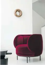  ??  ?? The Vuelta is a curved red velvet chair designed by Jaime Hayon in collaborat­ion with Austrian company Wittmann.