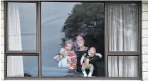  ?? PHOTO: PETER MCINTOSH ?? Under quarantine . . . Gina Kinnaird and her daughter CharliiMar­ee (left) and baby son Carlos are among those asked to stay isolated at home to help prevent the spread of measles in Dunedin.