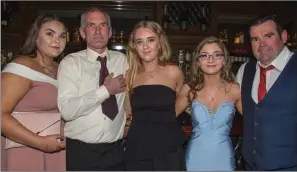  ??  ?? Kerrie, John, Molly and Emily Ross; and William Quinlan enjoying the Ballyduff GAA Victory Social in The Rose Hotel on Saturday night.