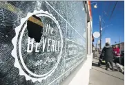  ?? ERNEST DOROSZUK/POSTMEDIA NEWS ?? The Beverly restaurant on Locke St. in Hamilton, Ont., was one of several storefront­s targeted by rock-hurling vandals on Saturday night.