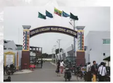  ??  ?? The entrance to the booming Myitkyina jade market.