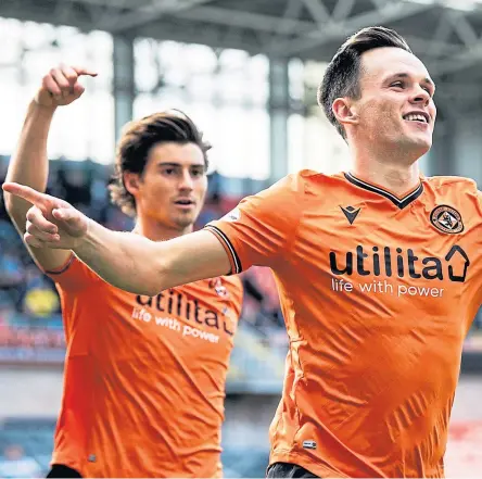  ?? Picture: SNS ?? Dundee United goal machine Lawrence Shankland celebrates scoring against Morton.