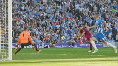  ?? Reuters ?? Manchester City’s Sergio Aguero scores a goal against Brighton during the Premier League match. —