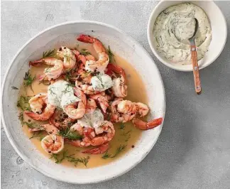  ?? James Ransom/New York Times ?? Butter-poached shrimp with dill mayonnaise takes on a mild and delicate flavor.