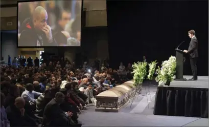  ?? PAUL CHIASSON, THE CANADIAN PRESS ?? Prime Minister Justin Trudeau addresses mourners at a ceremony Friday for three of the six men killed in the Quebec City mosque shootings.