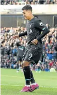  ?? Picture: Getty Images ?? Roberto Firmino scored the third goal for Liverpool when they beat Burnley 3-0 at Turf Moor last night.