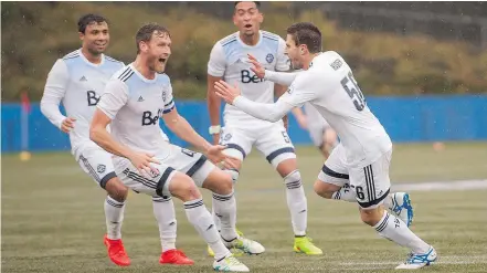  ?? RICHARD LAM/PNG ?? Whitecaps FC2 forward Daniel Haber, right, celebrates after scoring what proved to the be the winning goal against OKC Energy FC during playoff action at Thunderbir­d Stadium Saturday.