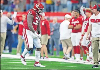  ?? [BRYAN TERRY/ THE OKLAHOMAN] ?? Jalen Redmond (31) celebrates after a stop in overtime of the Sooners' 30-23 win against Baylor in the Big 12 title game Dec. 7 in Arlington, Texas.