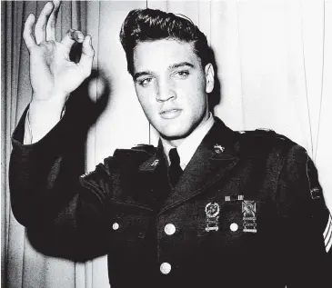  ?? PHOTO: REUTERS ?? Elvis Presley poses for the cameras in his United States Army uniform in early 1960. Presley entered the US Army at Memphis, Tennessee, on March 24, 1958, and served in Germany from October 1, 1958, until March 2, 1960, as a member of the 1st Medium Tank Battalion, 32nd Armor. He received his discharge from the Army Reserve on March 23, 1964. August 16 marks the 41st anniversar­y of his death.