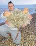  ??  ?? Tyronne Tanner with his thornback ray