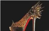  ?? Reuters ?? A shoe by Christian Louboutin with the trademark red sole.