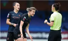  ?? Photograph: Catherine Ivill/ Getty Images ?? Manchester City’s Ellen White (centre) is pulled back by Lucy Bronze as she protests to referee Rebecca Welch against the penalty awarded against her.