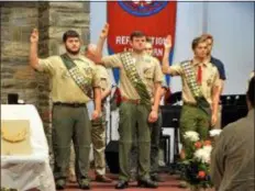  ?? SUBMITTED PHOTO ?? An Eagle Scout Court of Honor was recently held honoring, left to right, Michael Kutzmonich, Mitchell Davis and Samuel Rose of Troop 430 at Reformatio­n Lutheran Church in Media. These new Eagle Scouts have achieved the highest rank in scouting. Scoutmaste­r Dr. Scott Rothman leads the troop.