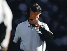  ?? NHAT V. MEYER — BAY AREA NEWS GROUP, FILE ?? Oakland Raiders head coach Jon Gruden stands on the sidelines during a game against the Tennessee Titans in 2019.