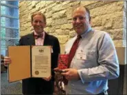  ?? SUBMITTED PHOTO - PA MUSEUMS ?? The Berks History Center was one of nine museums and historical societies to receive the Institutio­nal Achievemen­t Award, which was presented to Executive Director Sime Bertolet, left, and Curator Bradley K. Smith at PA Museum’s Annual Conference in...