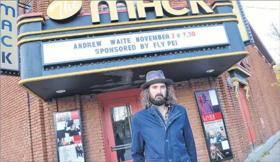  ??  ?? Andrew Waite stands outside The Mack in Charlottet­own where he will launch his new CD today at 7:30 p.m. Besides performing, Waite likes teaching music to young people.