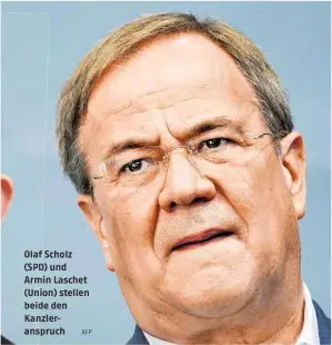  ?? AFP ?? Olaf Scholz (SPD) und Armin Laschet (Union) stellen beide den Kanzlerans­pruch