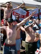  ??  ?? Chanting: Foxes fans in Madrid